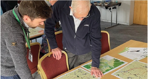 Community Engagement Day Looking at Plans